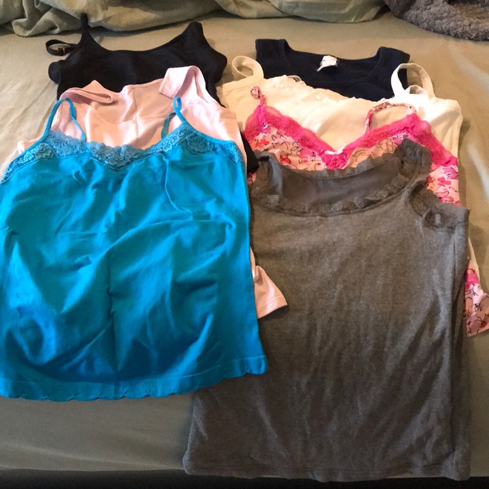 Lot of Seven Tank Tops Size Medium.